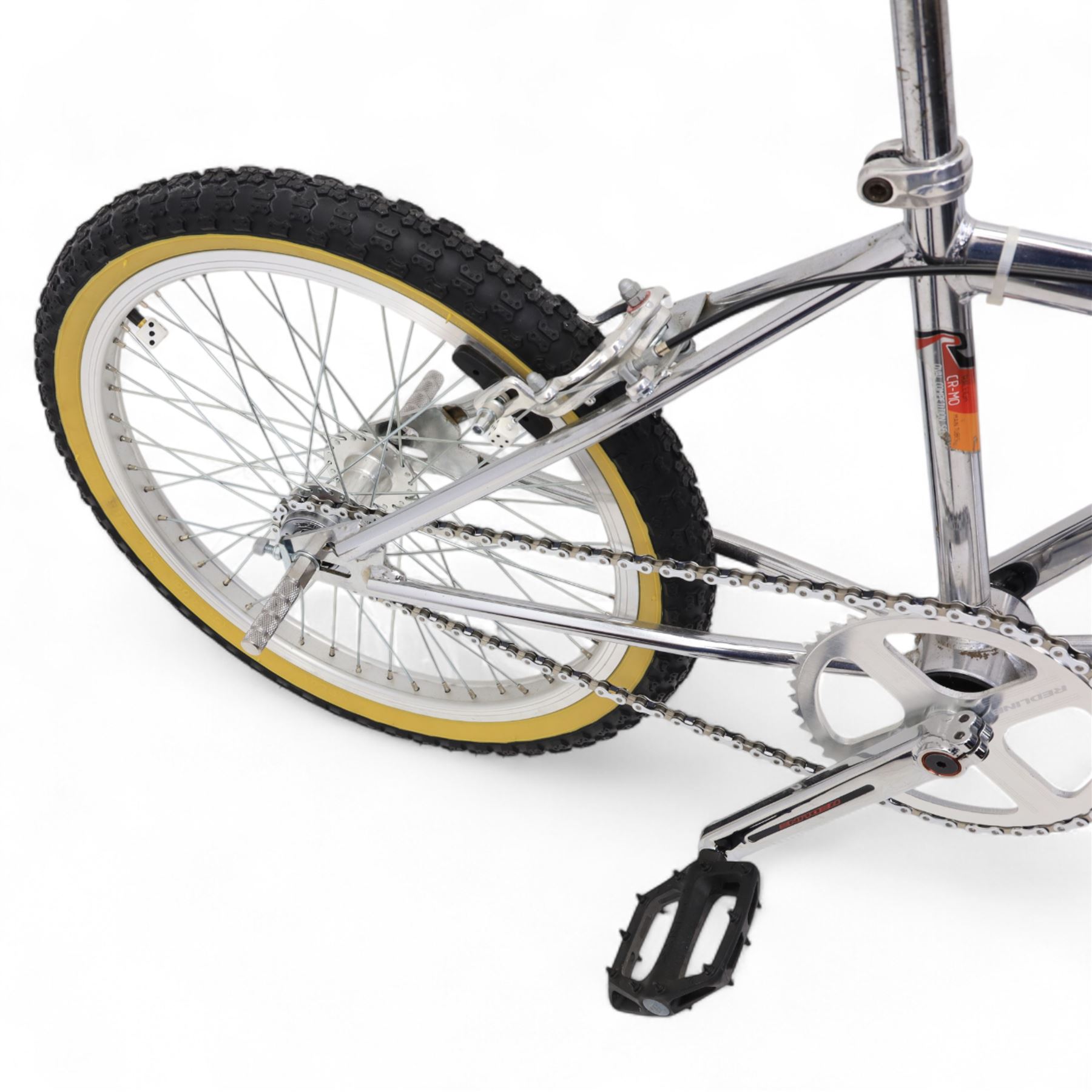 1980s Raleigh Cromo Burner BMX bike, with some original and some upgraded parts, including Oval Competition section frame and fork, Tange black rubber grips, Redline chain wheel, DMR Bikes V6 pedals and Duro Nylon F-075 tyres