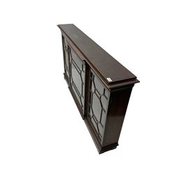 Early 20th century mahogany breakfront wall hanging bookcase, projecting dentil cornice over astragal glazed doors