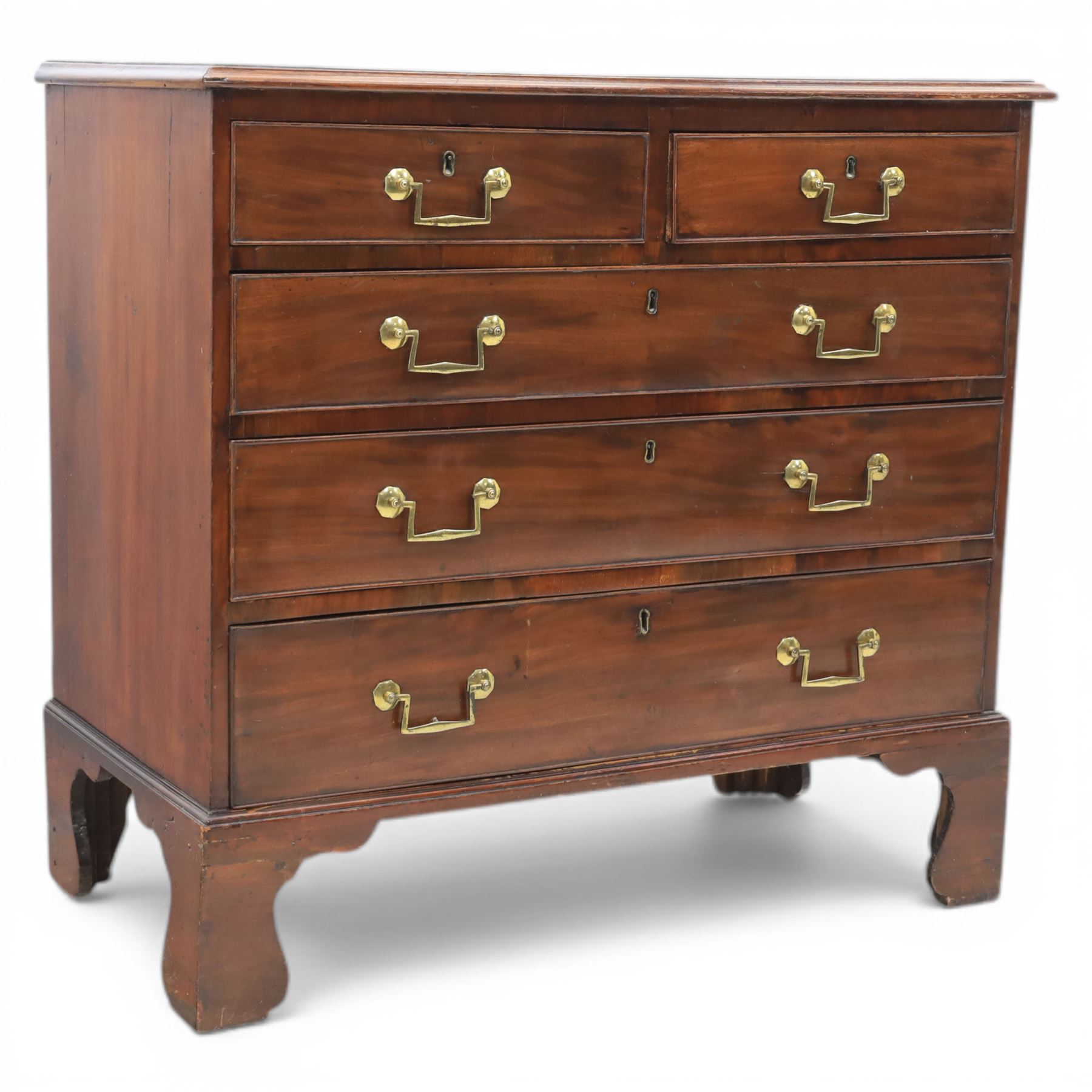 Small late Georgian mahogany chest, rectangular moulded top, above two short and three graduating long drawers, finished with square swan neck handles, raised on ogee bracket feet 
