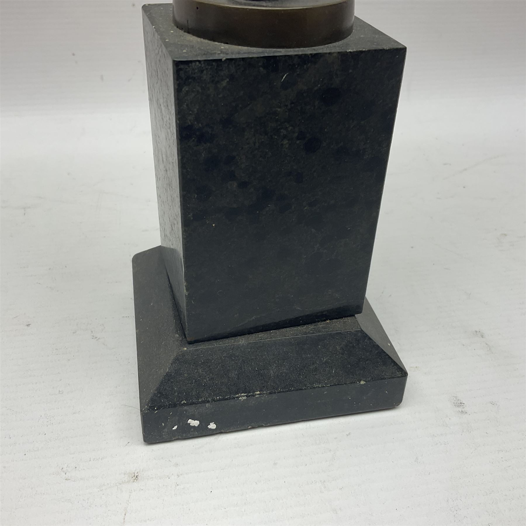 Bronzed semi nude female figure with one hand raised, upon a marble plinth, H43cm  