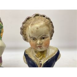 19th century pair of hand painted ceramic busts of children, together with a third similar example of a putti with a crown of ivy, tallest H23cm 
