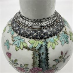 Pair of Chinese Republic porcelain vases, each painted in Famille Rose enamels with pairs of pigeons amidst peony, rock, flowering plants and leafy branches, possibly Qianlong seal beneath, H22cm 