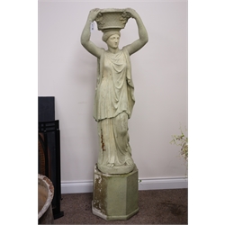  Large composite garden statue of a Roman goddess, standing supporting a flower basket, on octagonal pedestal, H130cm,   