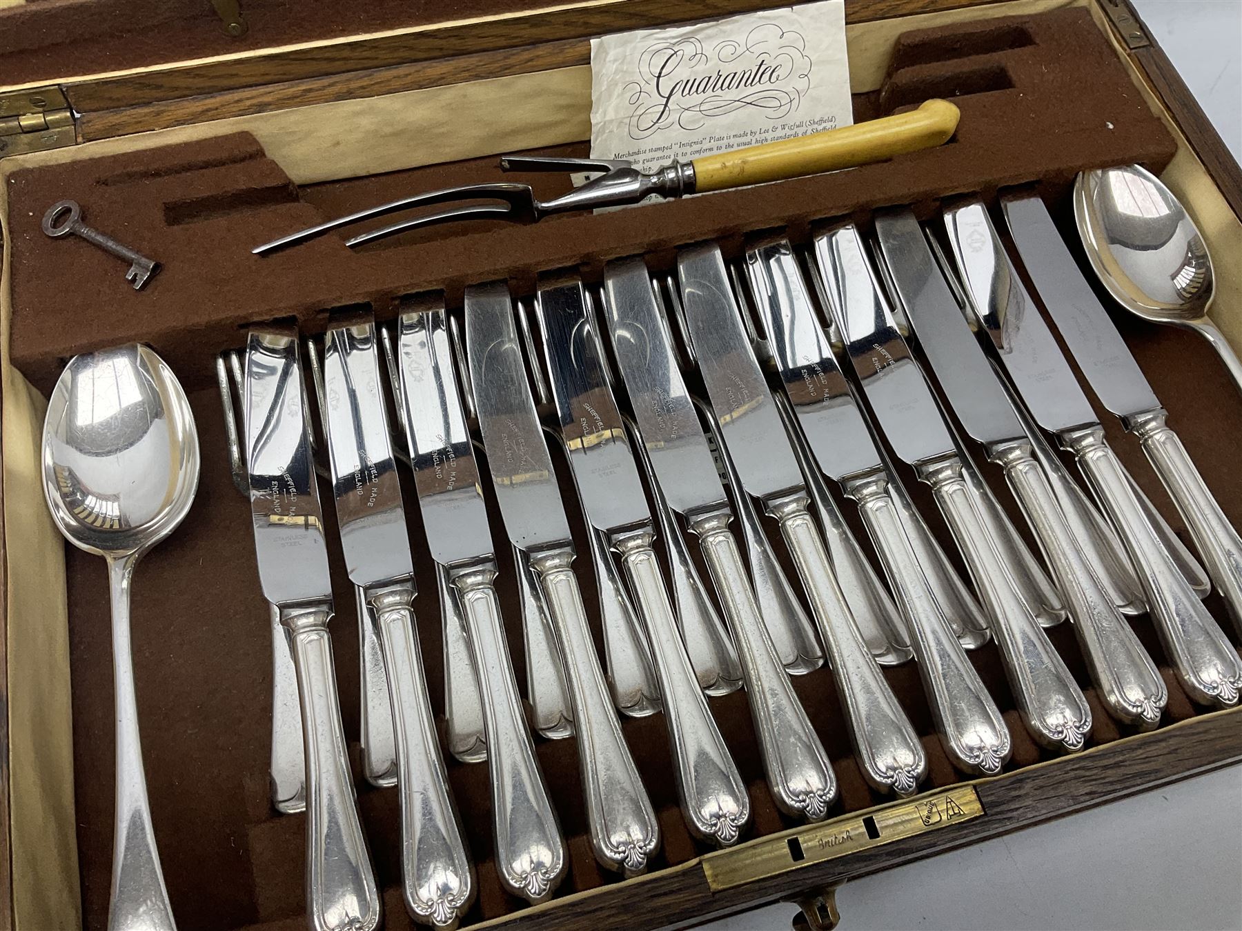 Twelve place setting canteen of cutlery by Lee & Wigfull Ltd, cased in an oak  chest, with key, meat carvers are missing, H18cm, L44cm 