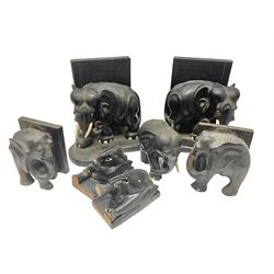 Three pairs of carved wooden elephant bo