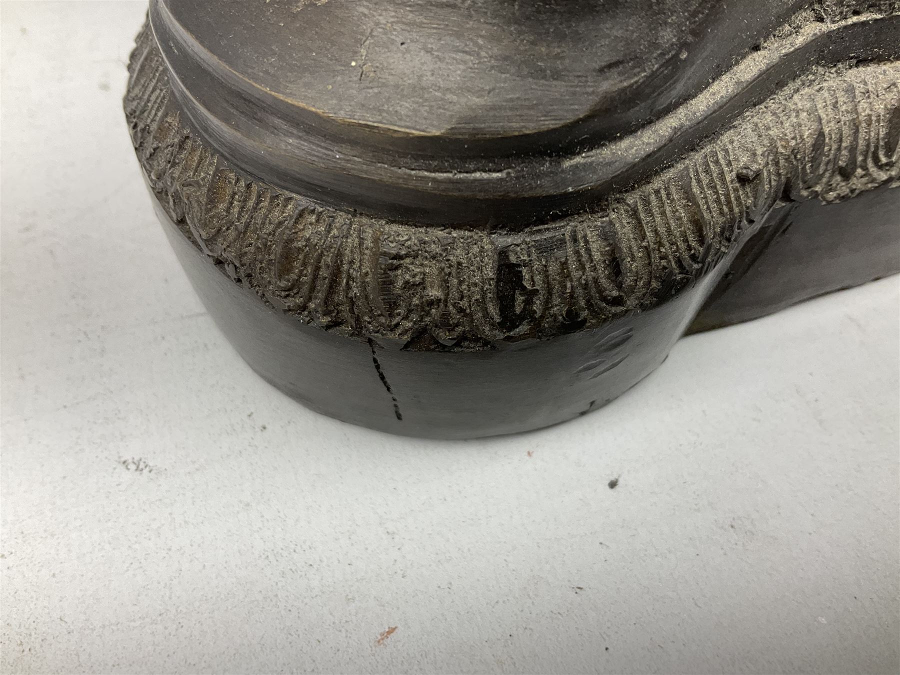 Large and impressive bronze figure of Wellington seated on a horse, on a sarcophogus shaped stepped base impressed 'Meunier Paris', the canted corners inset with battle trophies H68cm L50cm D22cm