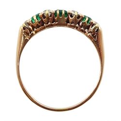 18ct gold emerald and diamond ring, central emerald with two tapered emeralds either side and six old cut diamonds set between