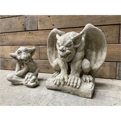 Composite garden Buddha figure and two gargoyle figures (3)