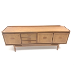  G-Plan teak sideboard, raised shaped back, three drawers flanked by three cupboard doors, tapering supports (W199cm, H78cm, D45cm)  and matching nest of three tables (W56cm, H52cm, D41cm)   