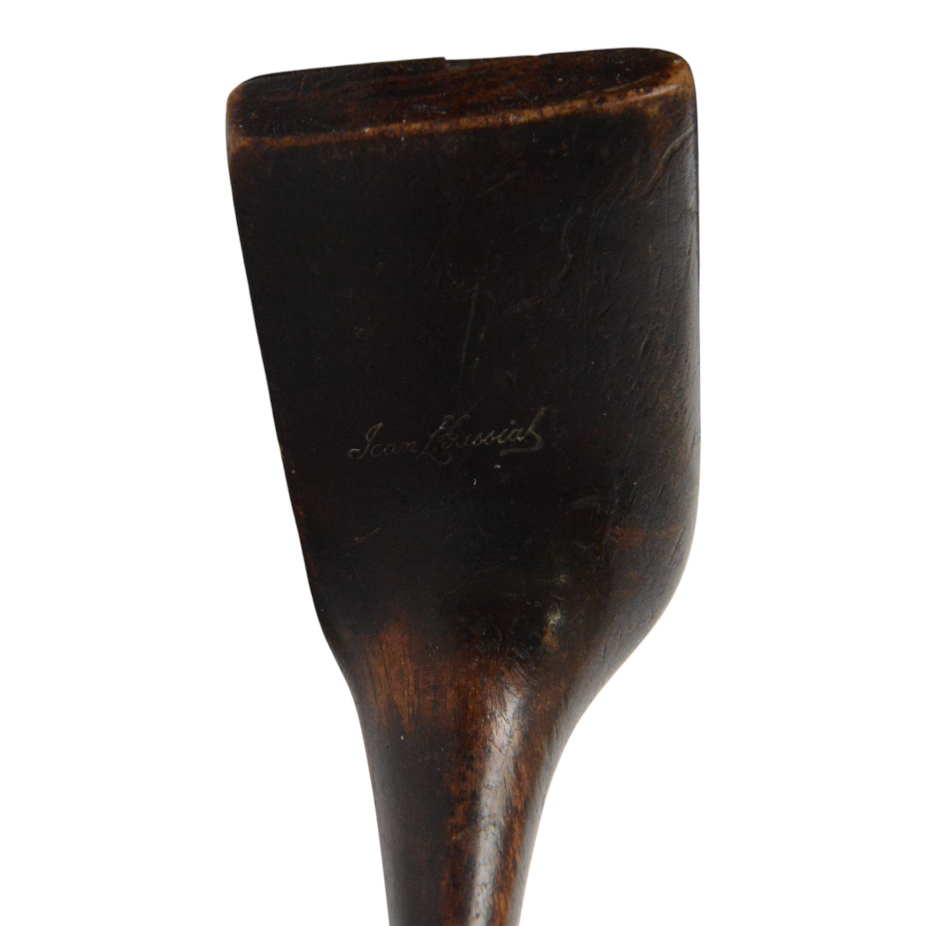 Jean Gassiat Persimmon putter, with half brass sole plate, hickory shaft, bound leather pistol grip, L87cm