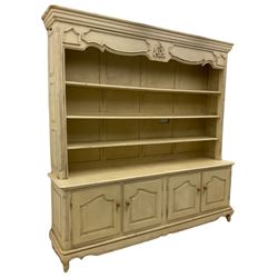 Large French style cream painted dresser, fitted with four cupboards and three tier plate rack