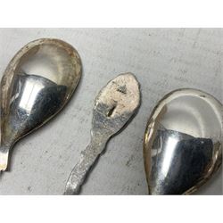 Set of four Continental silver spoons and forks, with stylised terminals, a number stamped S800, approximate weight 88.4 grams