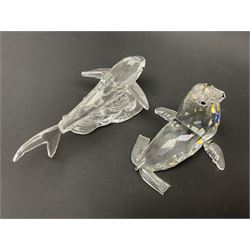 Nineteen Swarovski Crystal sea creatures, to include dolphins, seals, puffer fish, octopus, crabs, together with a quantity Swarovski Crystal shells 