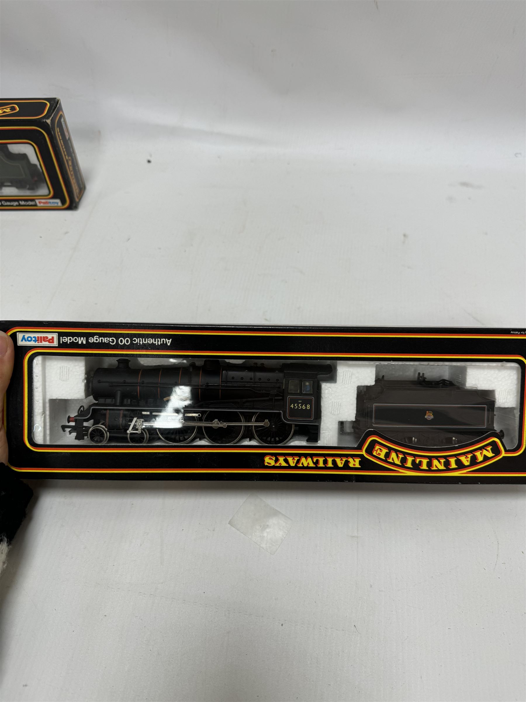 Seven Mainline Railways '00' gauge Jubilee Class 4-6-0 locomotives, comprising five 37062 in BR green livery, reworked as United Province no. 45578, Newfoundland no. 45573, Bellerophon no.45694, Nelson no. 45664 and no. 45691, 37047 Mars locomotive no. 45698 with Fowler tender in BR green livery and 936153 Western Australia locomotive no. 45568 in BR black livery, all boxed