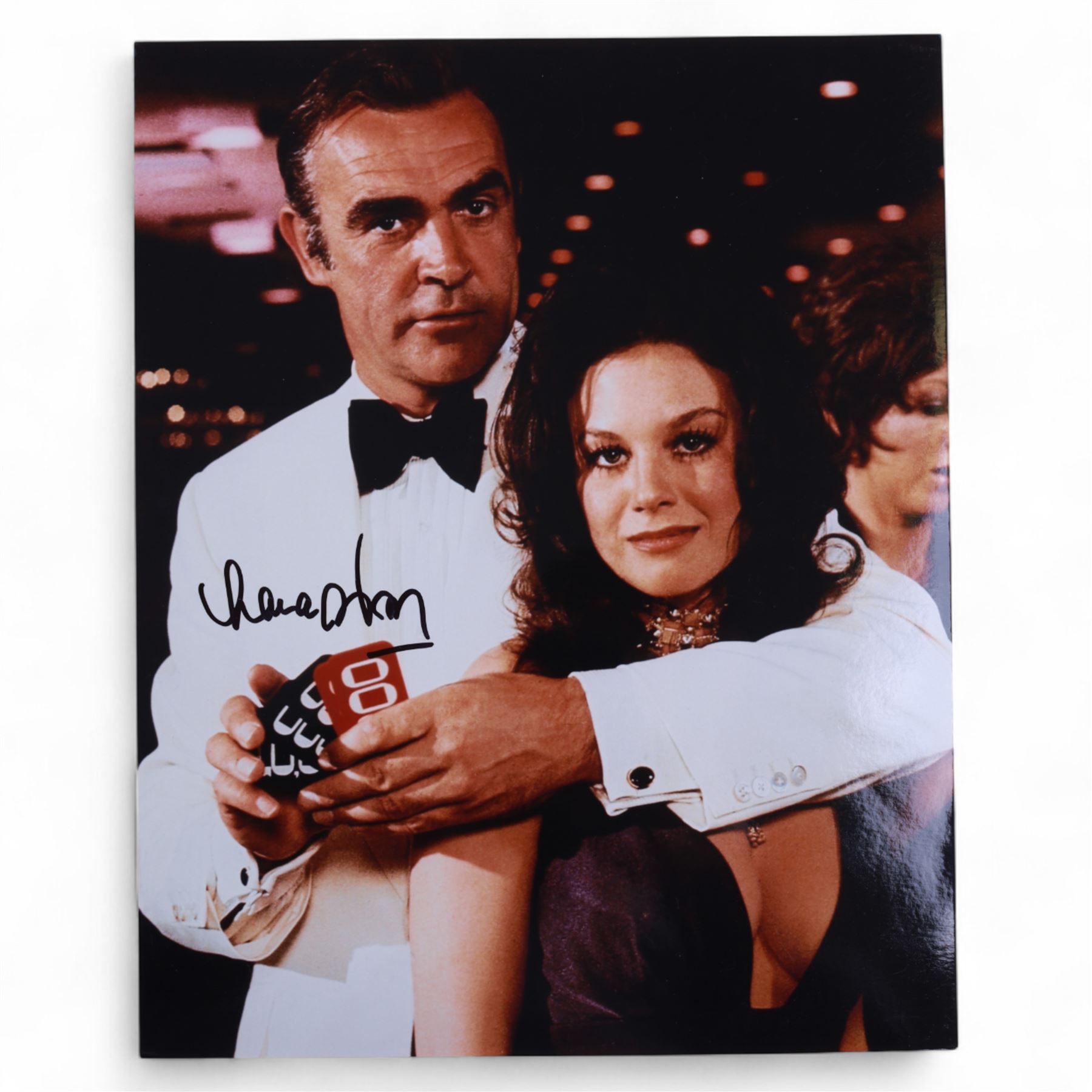 Eight James Bond signed 10 x 8