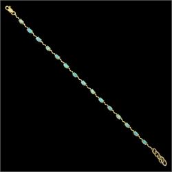 14ct gold opal bracelet, fifteen oval cut opal stones set between textured links, stamped 14k