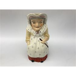 19th Century Toby jug modelled as a seated lady wearing a dotted pattern apron and shawl,  along with five Victorian and later fairings (6)