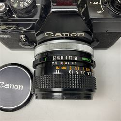 Canon FTb camera body, serial no. 715838, with 'Canon FD 50mm 1:1.8' lens, serial no. 207888, in original box, together with Canon FTb camera body, serial no. 557817, with 'Canon FD 35mm 1:3.5 S.C' lens, serial no. 126210 and Canon EX Auto camera body, serial no. 296244 with 'Canon EX 50mm 1:1.8' lens, serial no. 380869  