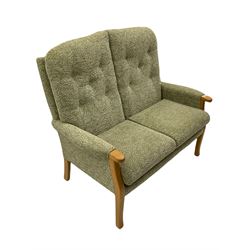 Three piece lounge suite - two seat settee (W125cm), and pair matching armchairs (W74cm), beech framed and upholstered in pale green fabric with leaf pattern 