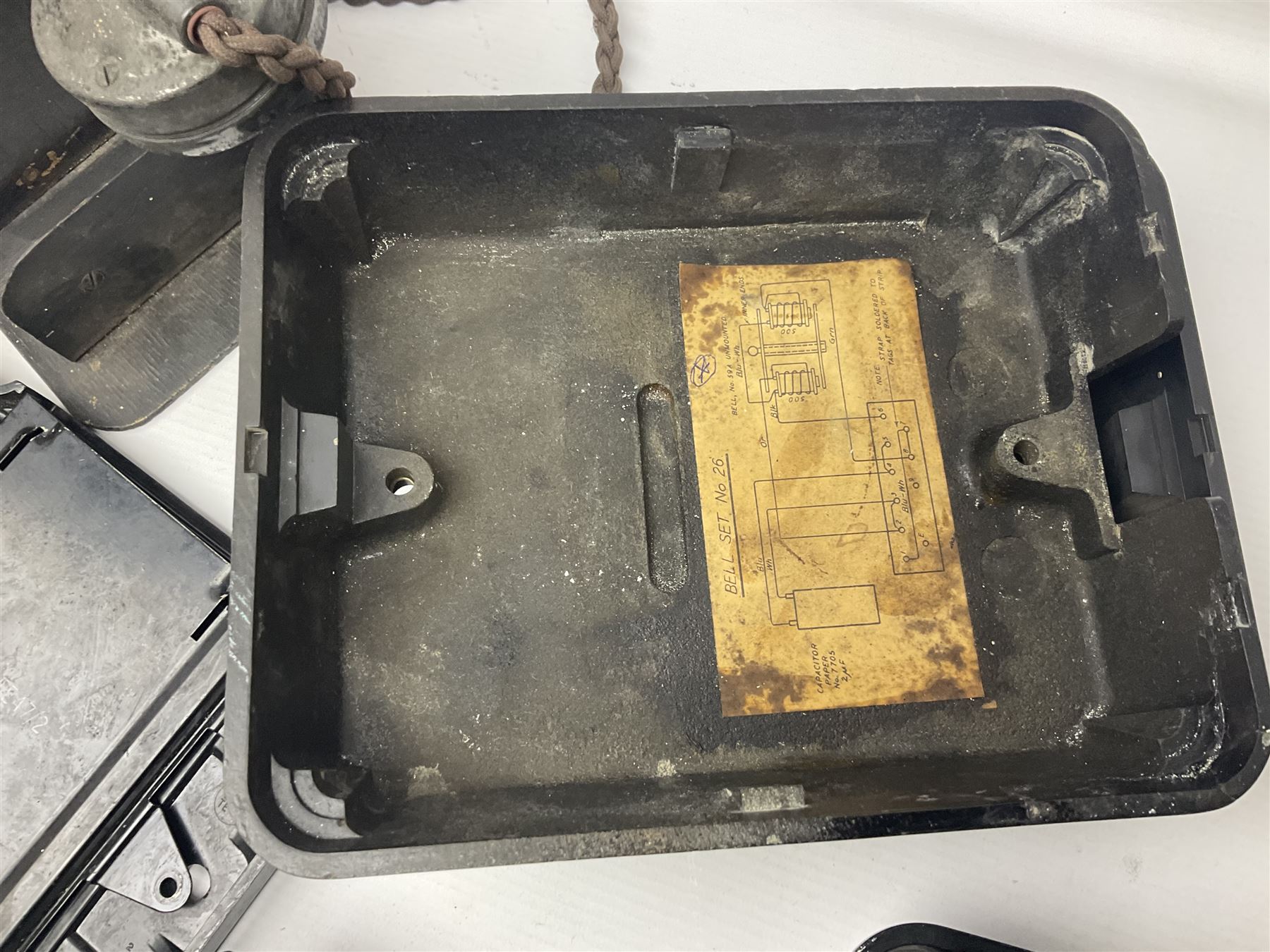 Collection of phone headsets, including GPO bakelite examples, together with other telephone parts 