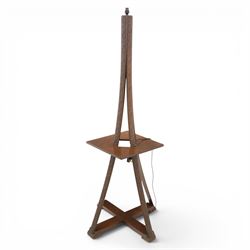 20th century stained wooden standing lamp, four foliate carved splayed supports, with square table platform, united by cruciform stretcher base, H158cm