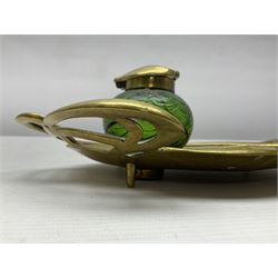 Art Nouveau Geschutzt brass desk stand, with stylised whiplash relief decoration, with removable Loetz style green glass inkwell, stamped to the base, H8cm