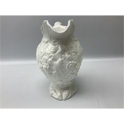 Pair of early/mid 19th century Copeland and Garrett white glazed pitchers, modelled in the Georgian style and moulded with the figures of Venus the Roman Goddess of Love, and Aurora the Roman Goddess of Dawn, within C scroll borders and foliate surround, the naturalistically modelled handle leading to a fruiting vine beneath the rim, upon a spreading base moulded with seashells, with printed green crowned wreath mark beneath, H20cm