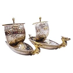 Pair of 20th century Japanese silver novelty cruets, modelled in the form of Viking long ships, marked Sterling Japan, contained within a fitted case, approximate silver weight 1.18 ozt (36.6 grams)