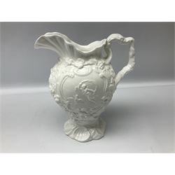 Pair of early/mid 19th century Copeland and Garrett white glazed pitchers, modelled in the Georgian style and moulded with the figures of Venus the Roman Goddess of Love, and Aurora the Roman Goddess of Dawn, within C scroll borders and foliate surround, the naturalistically modelled handle leading to a fruiting vine beneath the rim, upon a spreading base moulded with seashells, with printed green crowned wreath mark beneath, H20cm