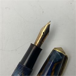 Two conway stewart 12 fountain pen 14ct gold nibs, in marble blue and marble green