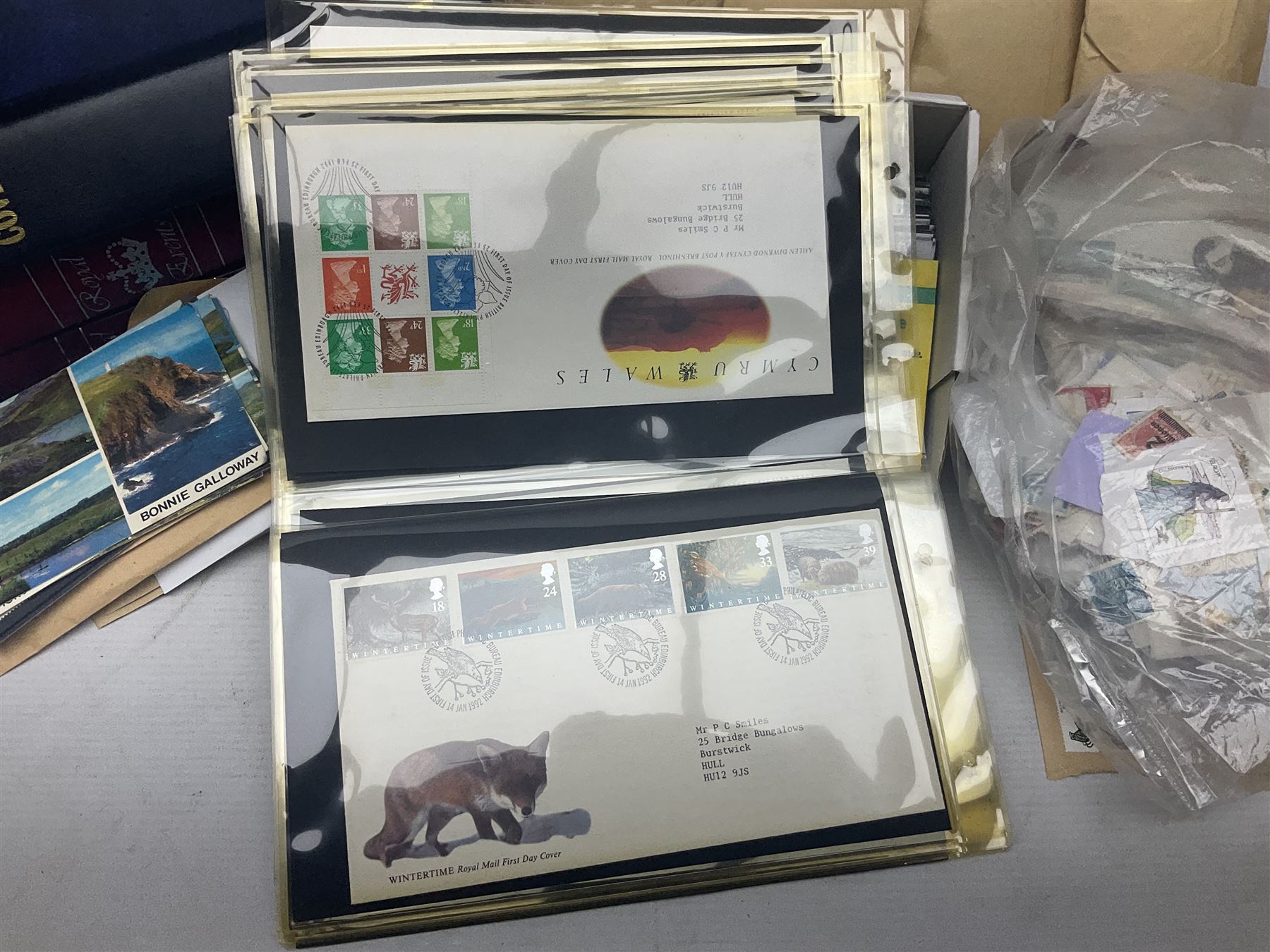 World stamps including Australia, Antigua, Canada, New Zealand, St Vincent, Republic of Maldives, Norfolk Island, Malta etc, Great British and other first day covers, Queen Elizabeth II 60th Birthday commemorative stamps etc, housed in five albums/folders and loose, in one box