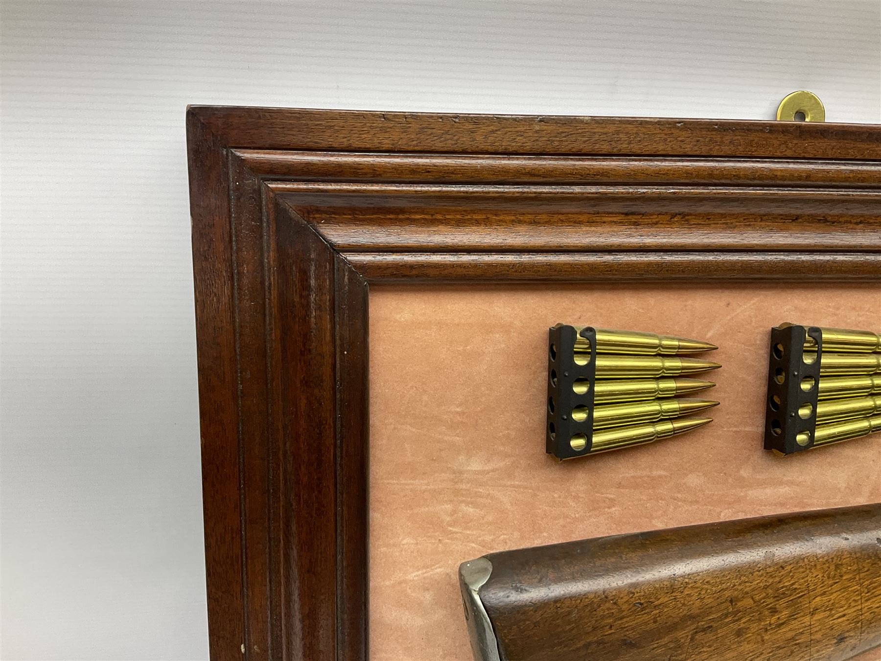 WW2 Lee Enfield No.4 Mk.1 .303 bolt-action rifle with hinged butt compartment, made by SA Ltd., Long Branch, Canada 1942, serial no.5L0646 L113cm; mounted on a framed display board with No.4 Mk.II spike bayonet, No.9 Mk.1 blade bayonet, two inert 5-round clips and brass biographical plaque by Antler Military Originals detailing DA Cert No.C3444 OLD STYLE DEACTIVATION SO FIREARMS CERTIFICATE REQUIRED OR RFD