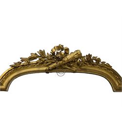 Large 19th century giltwood and gesso pier mirror, the stepped arch pediment decorated with central quiver surrounded by tailing ribbon and extending olive and floral branches, moulded frame decorated with beaded slip and ribbon twist, plain mirror plate 