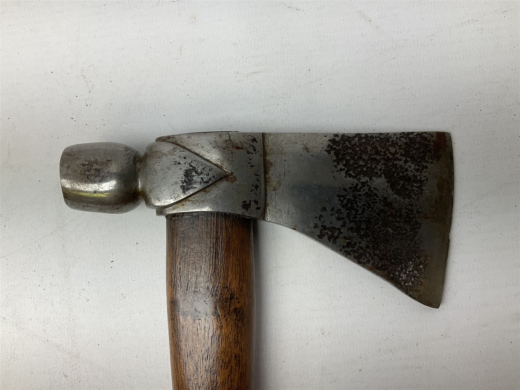 Early 20th century ceremonial Tomahawk pipe, steel axe head with pipe bowl, drilled drawing shaft, 46cm