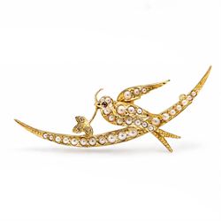 Early 20th century 15ct gold pearl and diamond swallow brooch, the split pearl set bird pe...