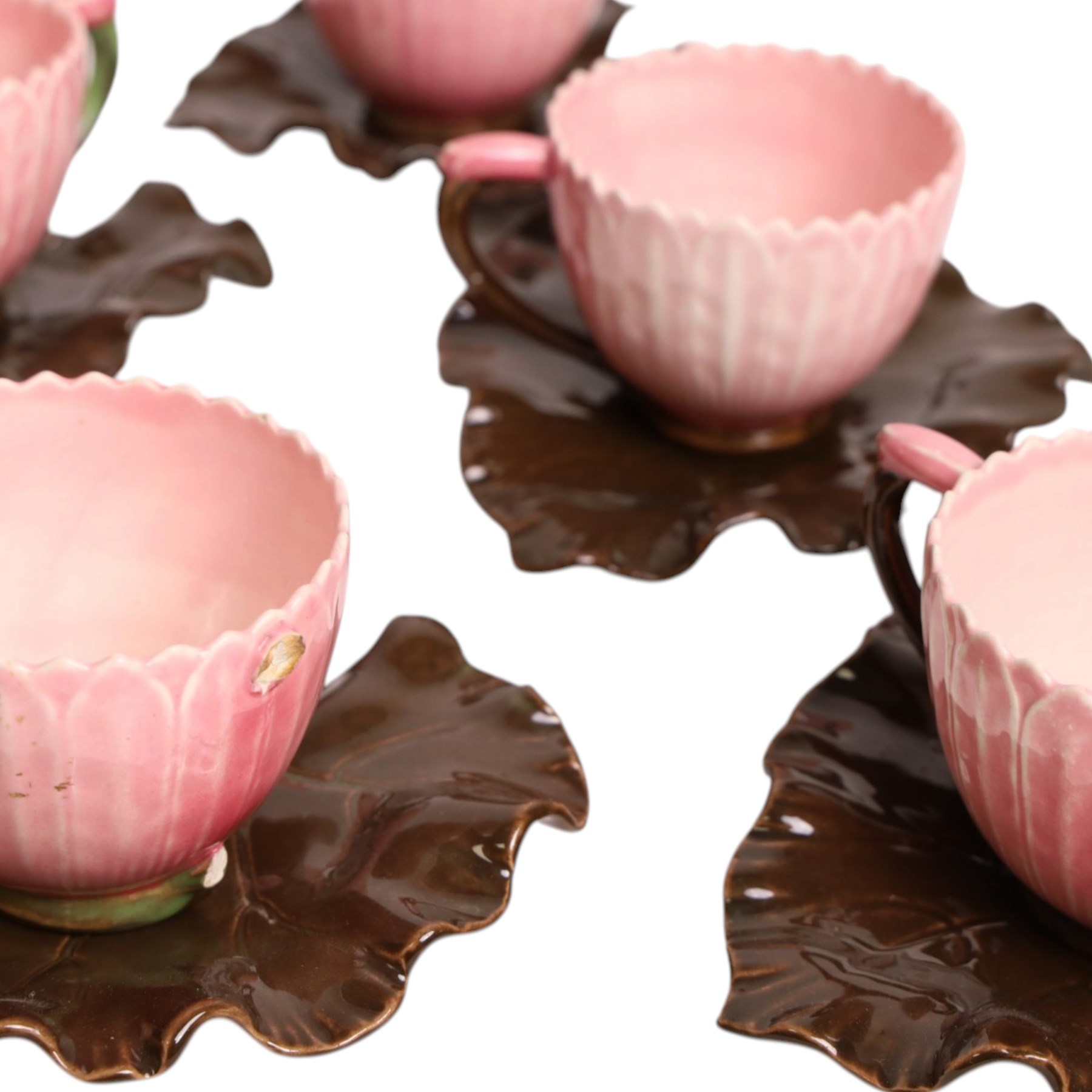 Set of six Zsolnay Pecs lotus moulded teacups and saucers, with impressed mark beneath, teacup D7cm
