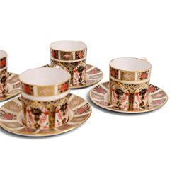 Eight Royal Crown Derby Old Imari 1128 pattern coffee cans and saucers