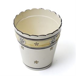 Russian, probably Gardner figure of a man pushing a wheelbarrow on gilt lined rectangular base, impressed mark, H16cm, 18th century creamware beaker with star shape decoration, 18rh century Worcester cup with panels of flowers on a blue ground and a French shell shape scent flask (4)