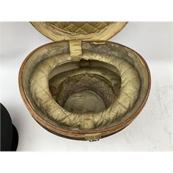 Early 20th century black silk top hat by Woodrow of Manchester and London, with manufacturer's stamp to the silk lined interior, housed in fitted tan leather hat box with removable internal compartments with straps, brass escutcheon and engraved plaque, hat internal measurements approx 20cm x 15cm