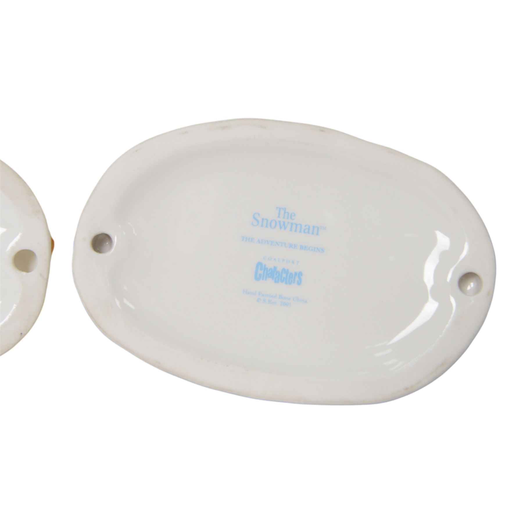 Five Coalport The Snowman figures, comprising Adding a Smile, Walking in the Air, Snowman's Surprise, The Adventure Begins and The Hug, three boxed