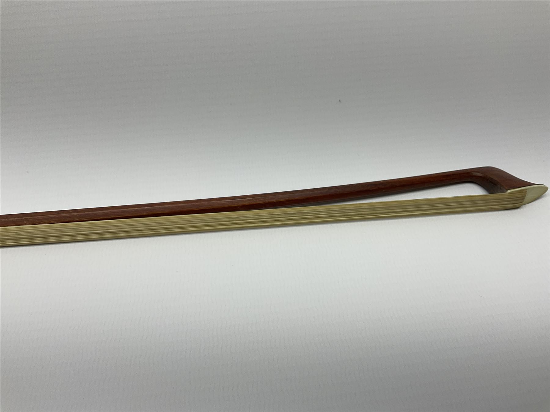 Alfred Knoll silver mounted two-star pernambuco violin bow L74.5cm