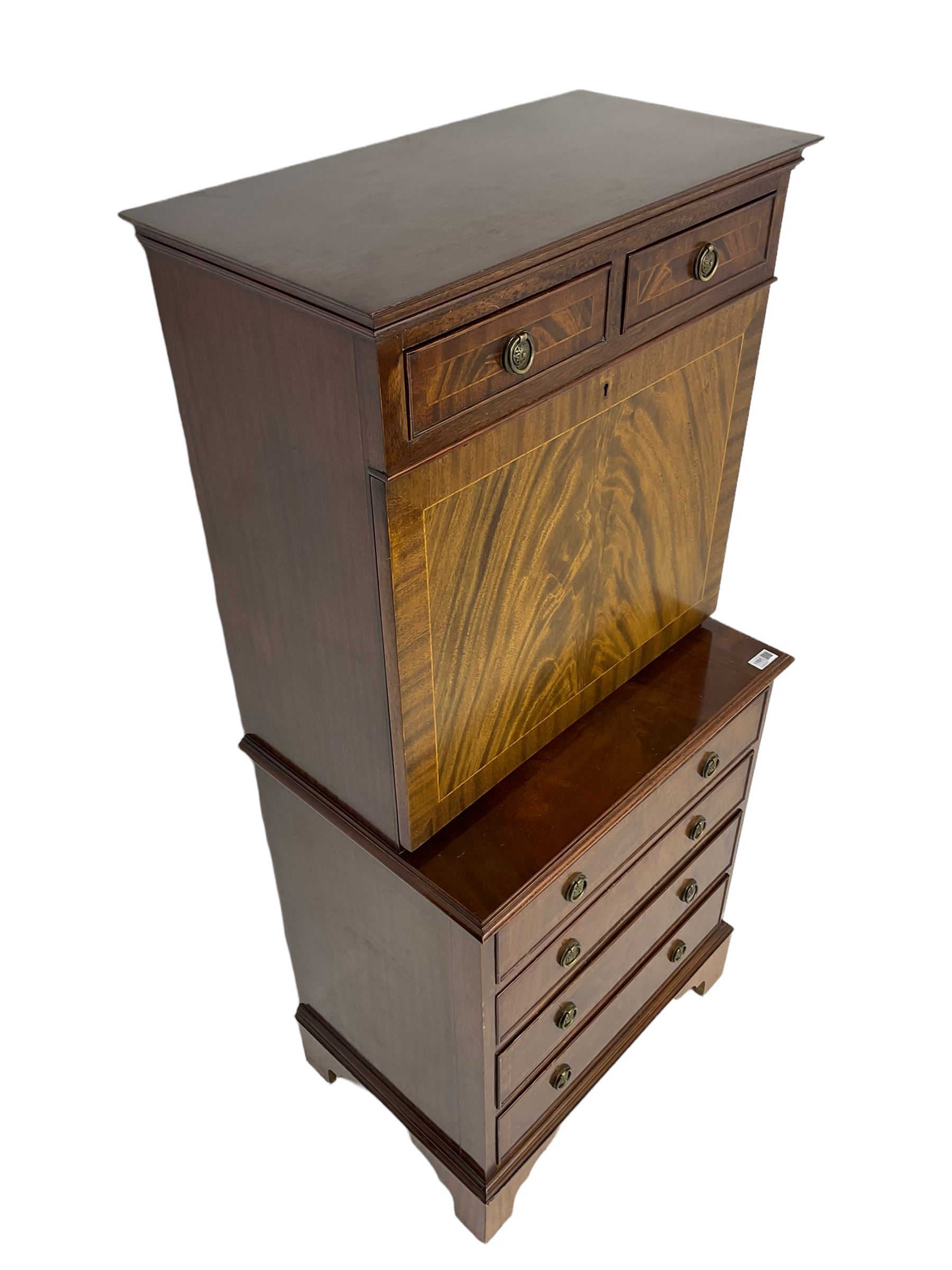 Shaw of London - mahogany secretaire chest, the upper section fitted with two drawers over fall front enclosing drawers, cupboard and pigeon holes, the lower section fitted with four graduating drawers, on bracket feet