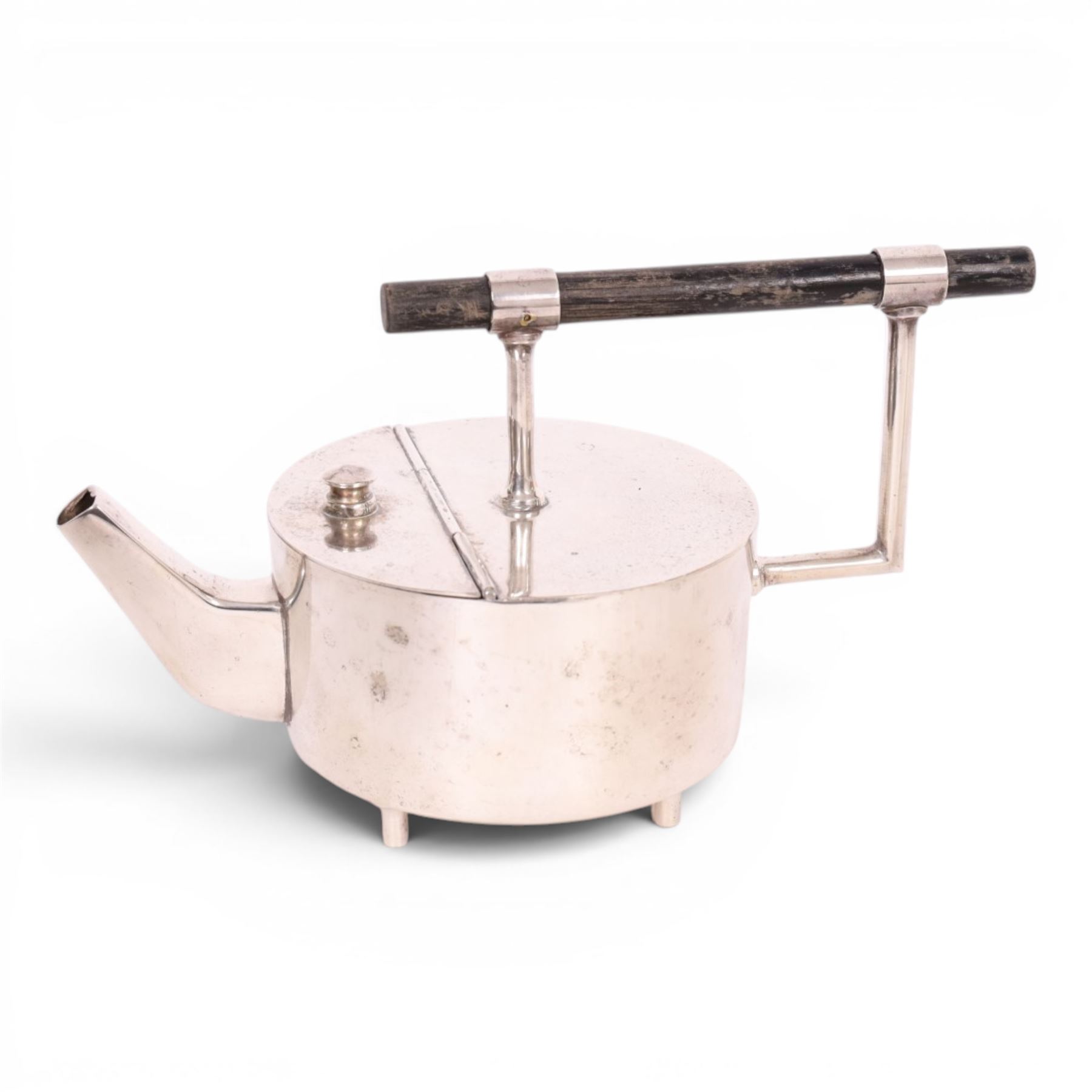 Manner of Christopher Dresser (1834-1904) - James Dixon and Sons teapot together with Hukin & Heath Christopher Dresser design coffee pot, of tapering cylindrical form with a strapwork handle, teapot H13cm 