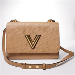 Louis Vuitton - ‘Twist’ MM Bag, the model introduced for the Cruise 2015 collection under Nicolas Ghesquière, in structured beige Epi cow hide leather with black sides, with gold-tone signature LV monogram twist-lock fastening and chain carrying handle, with detachable flat leather shoulder or crossbody strap, unused with original box and dust bag