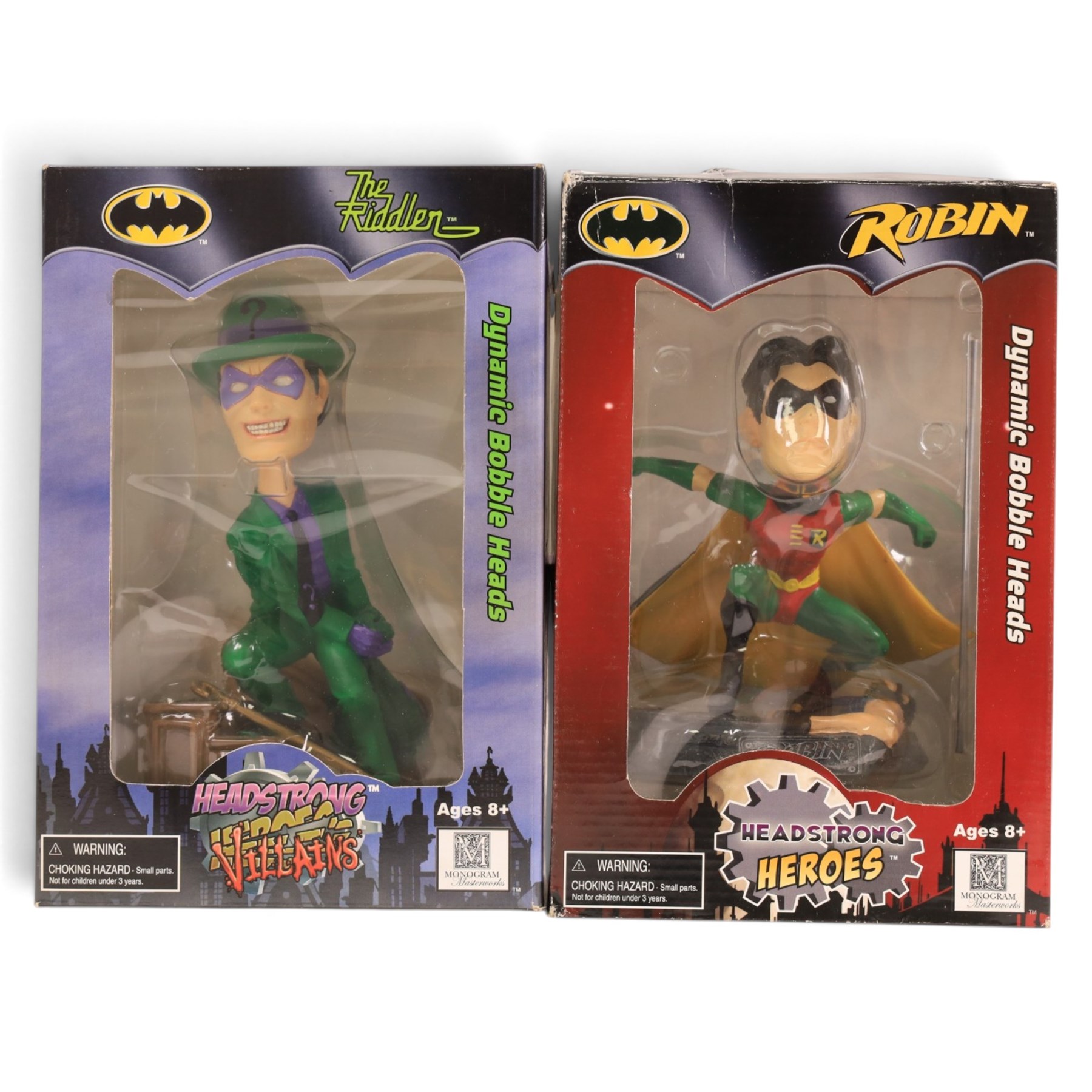 Four Monogram Headstrong Heroes bobble heads, comprising Superman, The Riddler, Catwoman and Robin, together with a DC Direct Deluxe Action Figure Set, DC DIrect Hush The Riddler figure and a Mattel Batman & Superman figure pack, all boxed