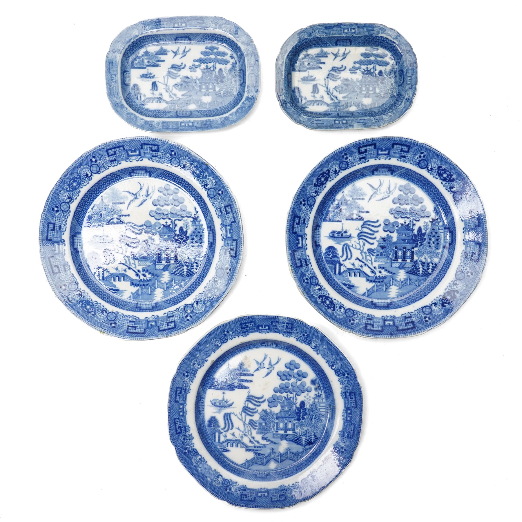 Five 19th-century willow pattern plates, two small meat platters and three plates, largest D24.2cm (5) 