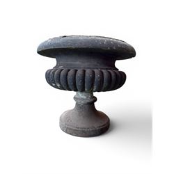 Carved sandstone garden urn, gadrooned campana form