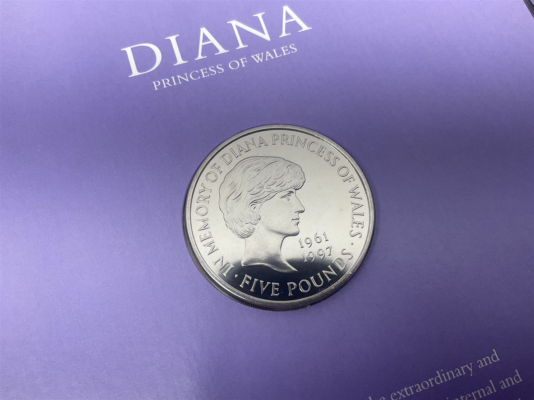 Eleven Queen Elizabeth II cupronickel five pound coins, in card folders or on cards