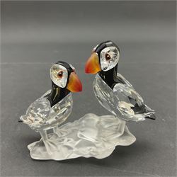 Three Swarovski Crystal bird figures, comprising Toucan, pair of puffins and pair of parrots on a branch, tallest H10cm