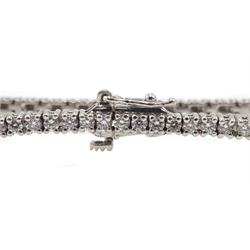  18ct white gold diamond line bracelet, stamped 750 approx 2 carats total  